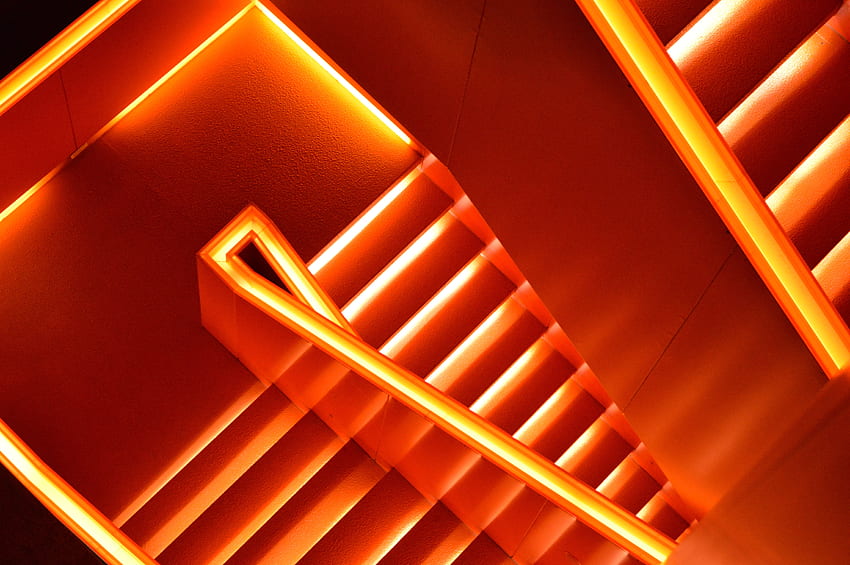 A Stairway Illuminated By Bright Orange Neons Tape Lights Orange