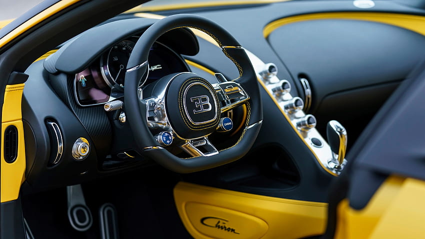 Bugatti Chiron Gelbes und schwarzes Interieur. Auto HD-Hintergrundbild