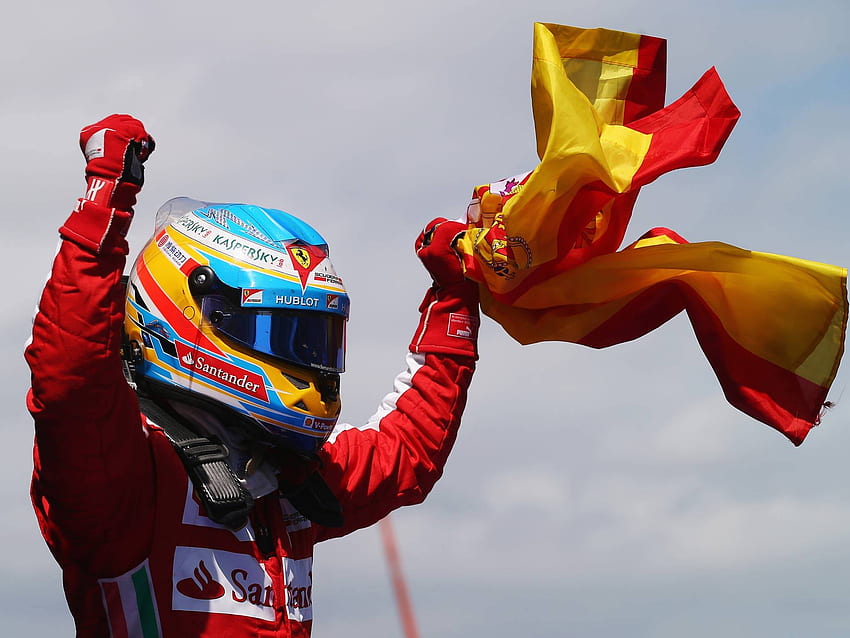 Fernando Alonso emocionou uma enorme bandeira de 95.000 acenando para a multidão no domingo, quando dirigiu sua Ferrari para uma vitória dominante no Grande Prêmio da Espanha: Fórmula 1 papel de parede HD