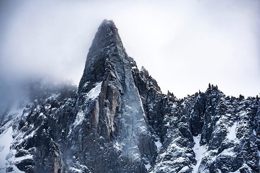Rocky cliff, fog, mountains HD wallpaper