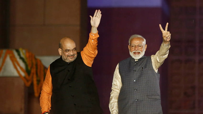 Il pm Modi e il presidente del Bjp Amit Shah fanno un gesto al Bjp - Narendra Modi Election 2019 Sfondo HD