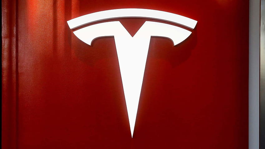 Tata Motors aclara la postura en torno a los rumores de asociación con Tesla, logotipo de Tata fondo de pantalla