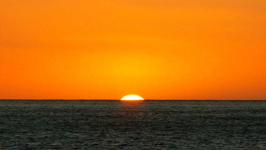 Preview orange, dark blue, sea, horizon, sun HD wallpaper