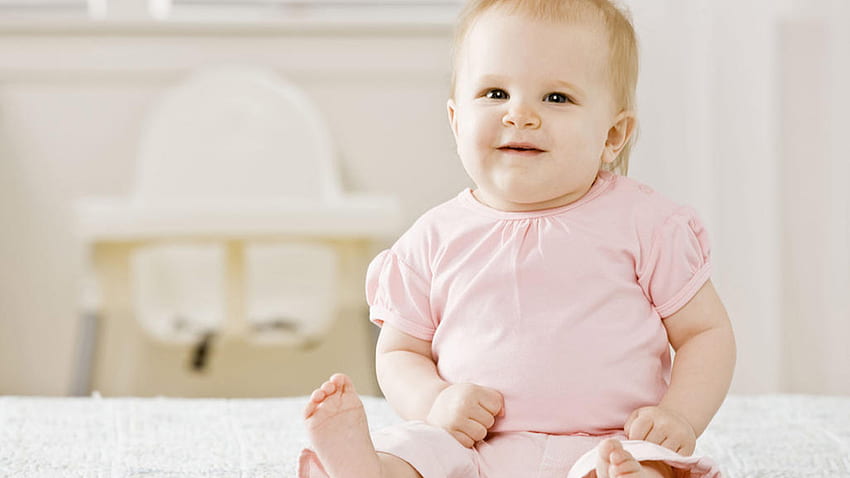 Cute Baby Girl Is Wearing Light Pink Dress Sitting In Blur Background Cute HD wallpaper