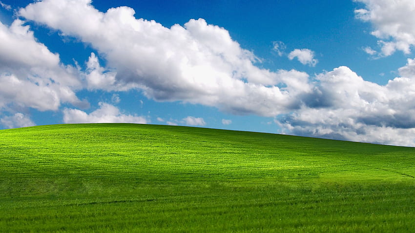 Colossal Titan shows up in the Windows XP wallpaper