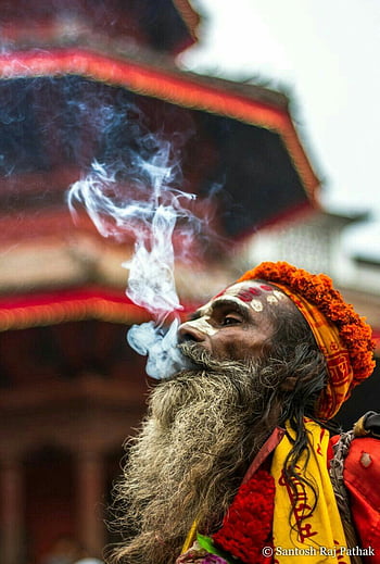 An Old baba (Hindu honorific) smoking a traditional chillum. Smithsonian  Contest HD phone wallpaper | Pxfuel