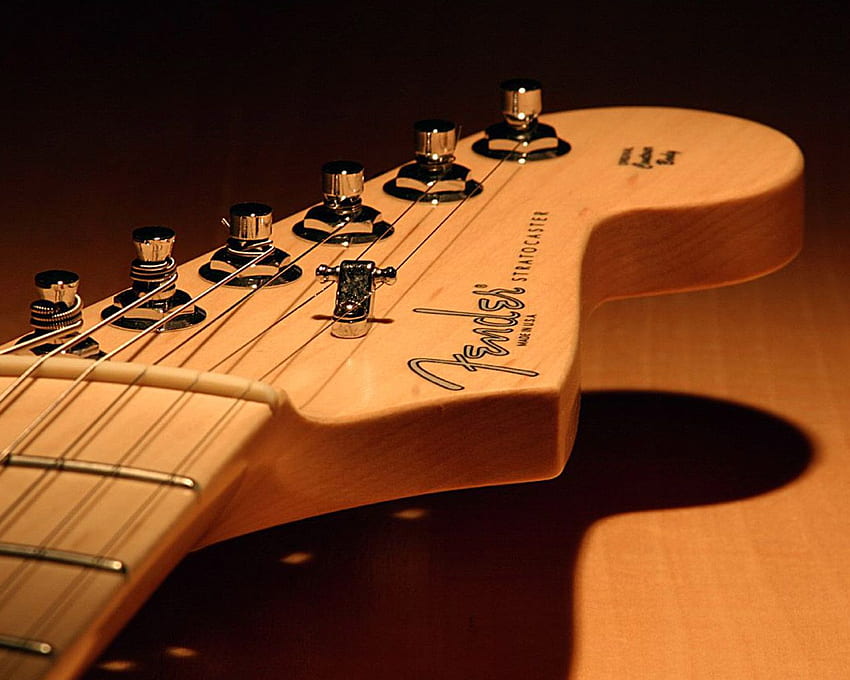 Les Paul vs Stratocaster, logotipo de Fender fondo de pantalla