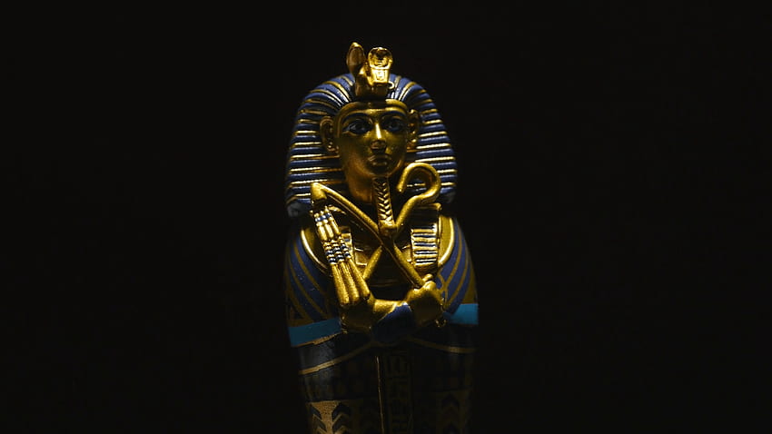 Rotierendes Pharao-Grab-Artefakt - ägyptische Archäologie-Nahaufnahme, goldener Pharao HD-Hintergrundbild