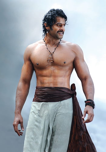 HD wallpaper Baahubali Prabhas one person adult waist up weapon the  past  Wallpaper Flare