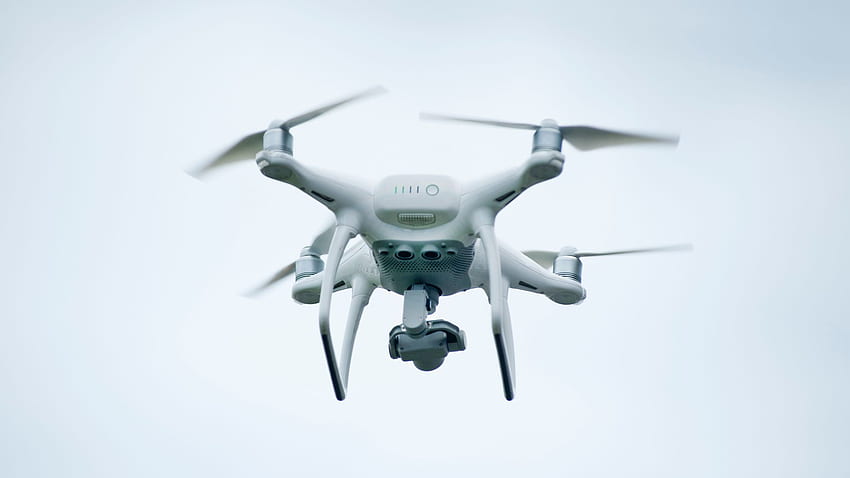 Drone quadricottero bianco Sfondo HD