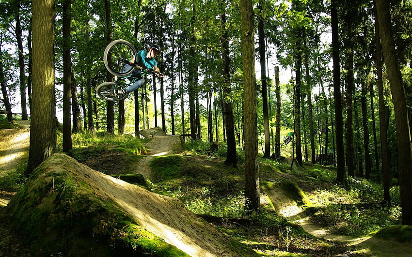 Mountain biking bike bicycle extreme wheels track racing jump flight fly air landscapes nature trees forest sunlight shade hills people ., Dirt Jump HD wallpaper