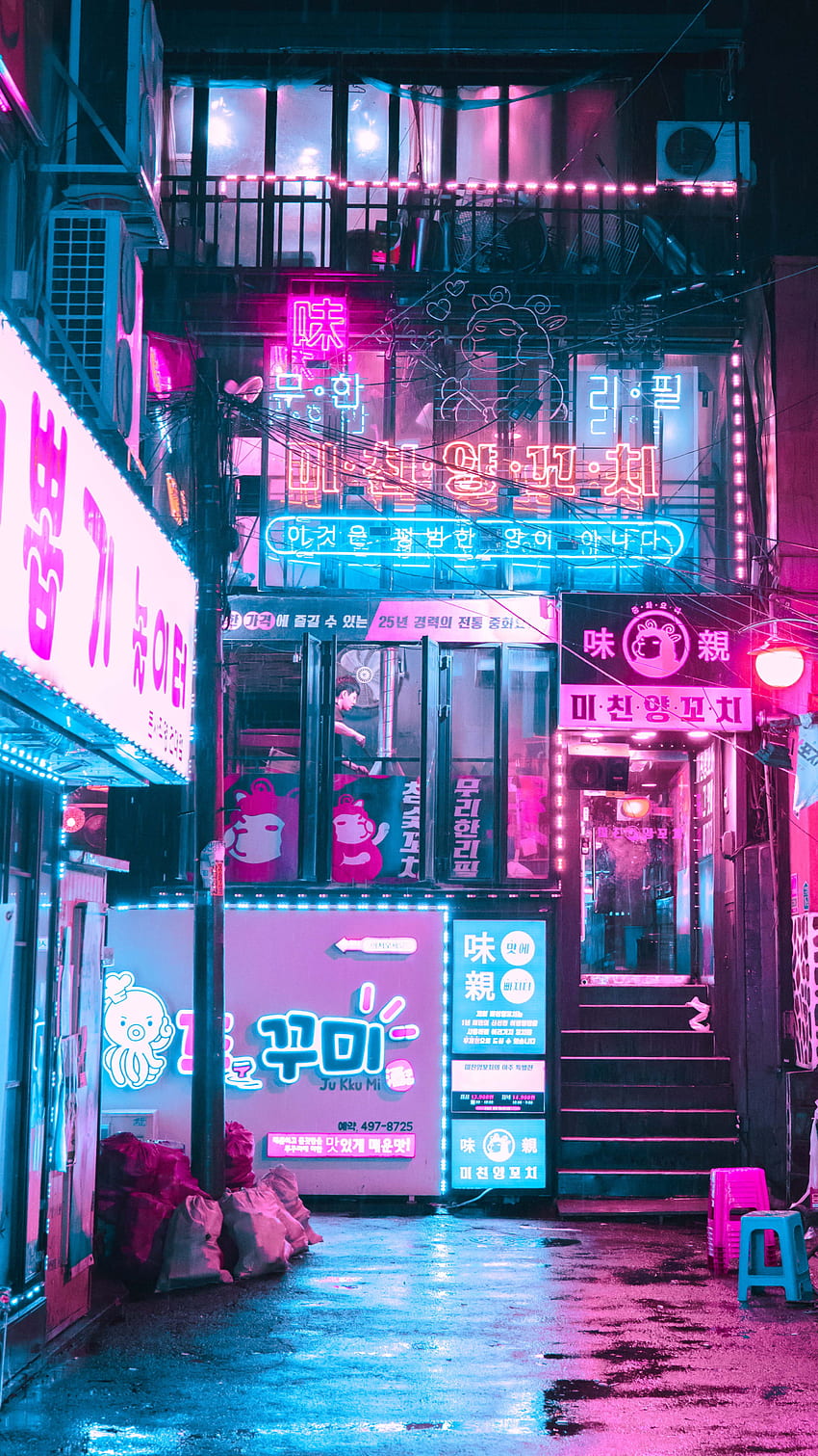 Premium AI Image  Aesthetic cityscape synthwave retrowave wallpaper with a  cool and vibrant neon design