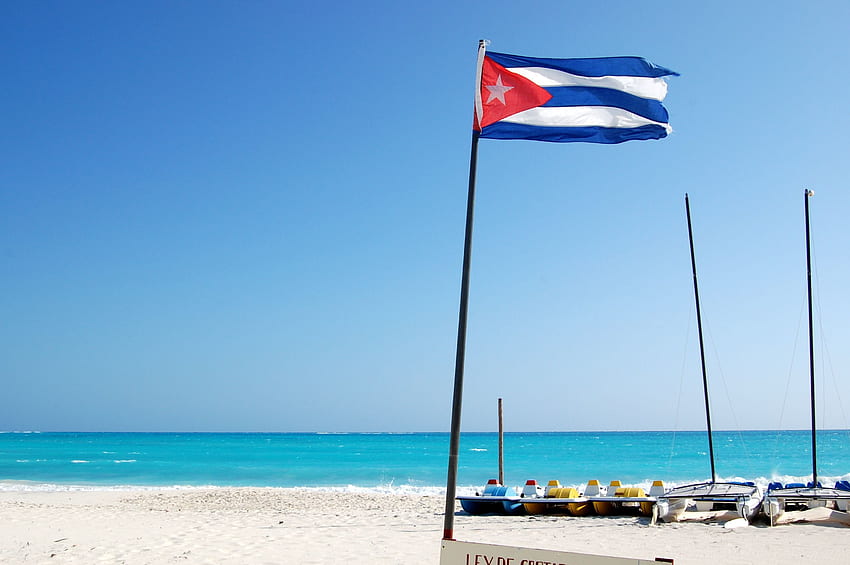 Flag of Cuba on the beach in the resort of Cayo Largo, Cuba HD wallpaper
