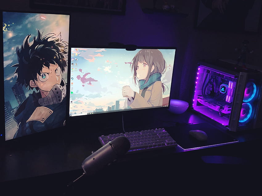A close up of neon picnic setup with anime on laptop screen