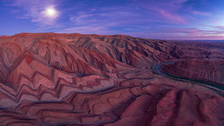 Moonrise over the jagged teeth of the Raplee Anticline near Mexican Hat