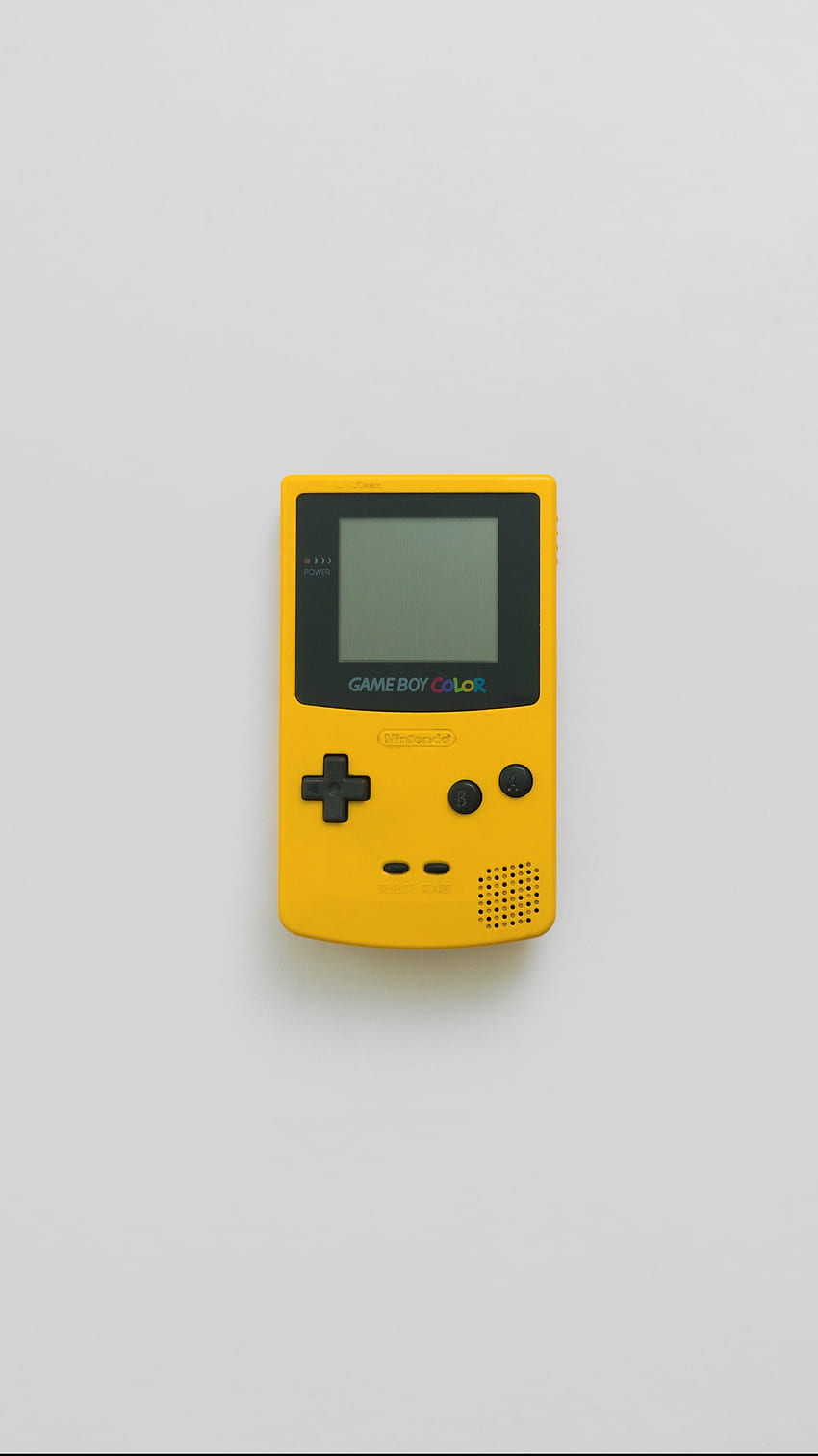 Gelbe Gameboy-Farbe minimal. Smartphone HD-Handy-Hintergrundbild