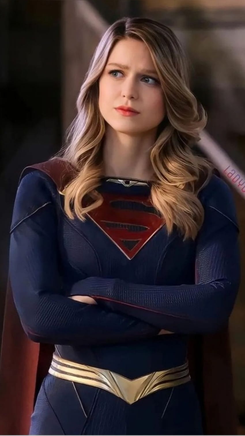 Supergirl, face, hair, sg, pose, superhero, suit HD phone wallpaper