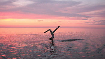 Gymnastics beach cartwheel pink tumbling HD phone wallpaper  Peakpx