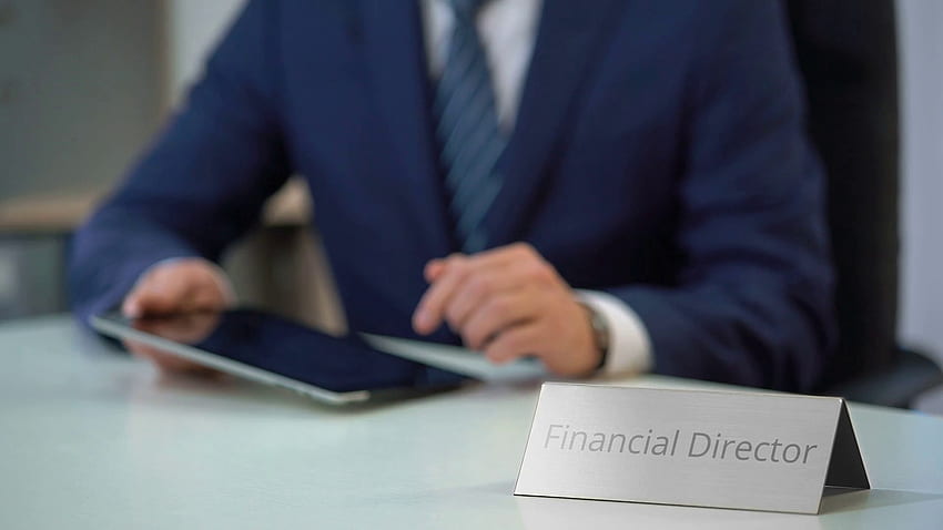 Busy Financial Director Of Corporation Using Tablet HD wallpaper