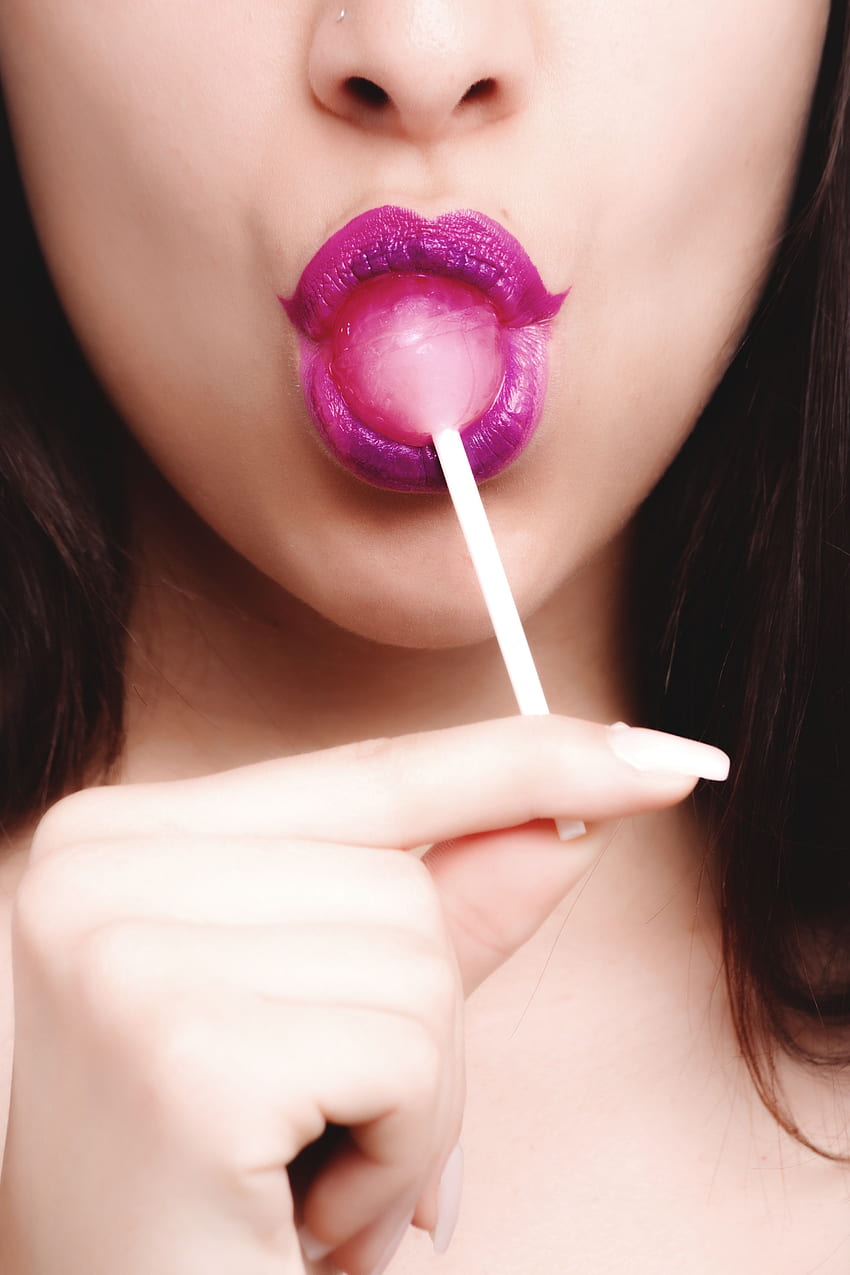 Woman With Pink Lipstick Licking Strawberry Lollipop · Stock HD phone wallpaper