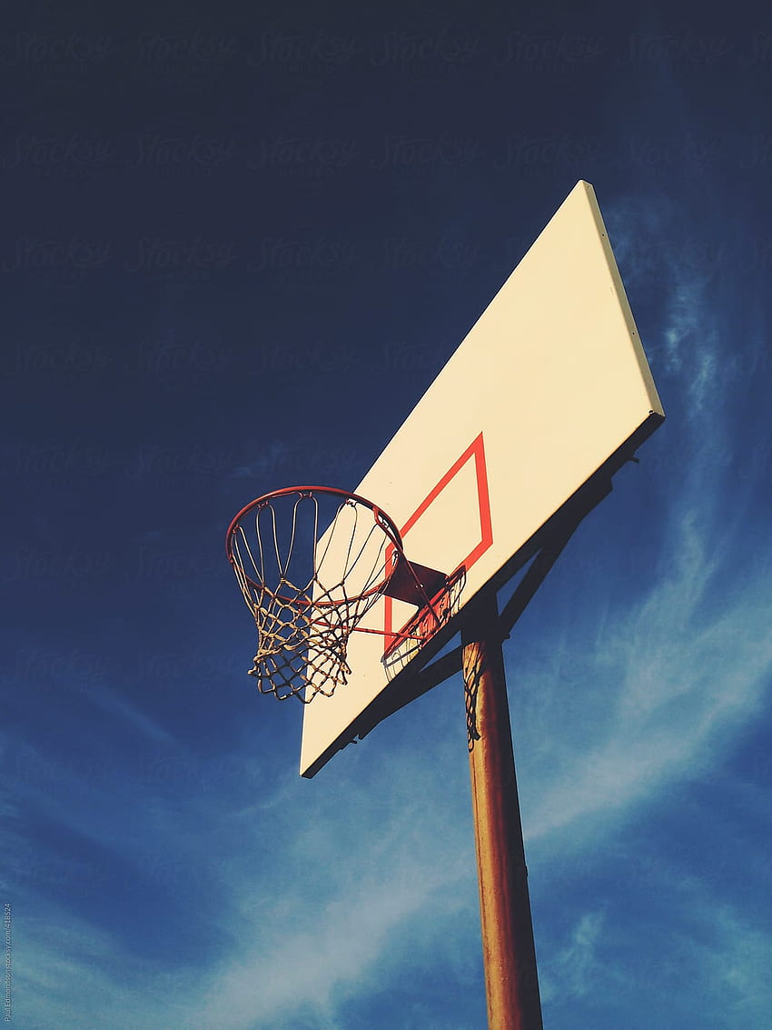 Basketball hoop with blue sky in background, dusk by Rialto - Hoop, Basketball HD phone wallpaper