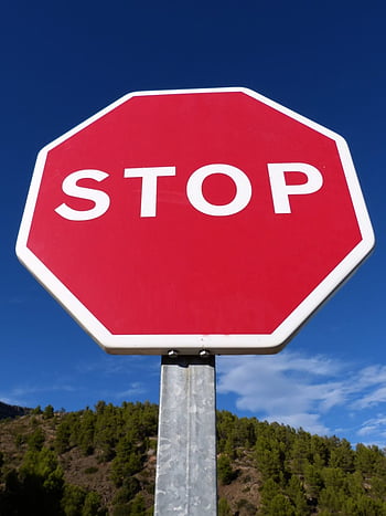 : red, sky, flag, wind, stop sign, number, signage, street sign ...