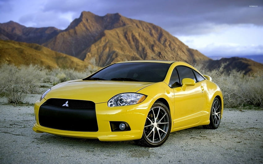 Yellow 2010 Mitsubishi Eclipse front side view - Car HD wallpaper