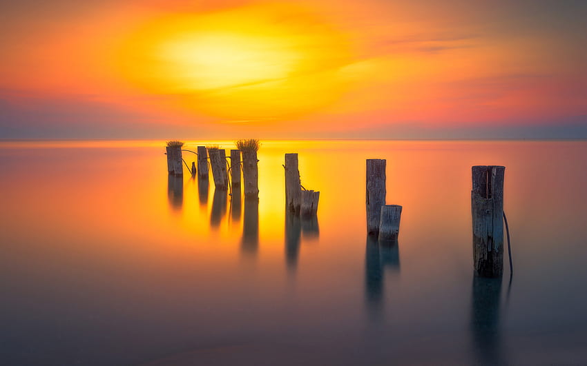 Sunrise, pilings, water, lake HD wallpaper