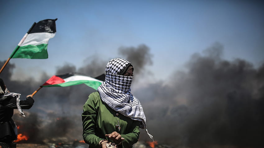 ガザ地区のイスラエル国境フェンスでの抗議で数十人のパレスチナ人が殺された、と報告書は言う 高画質の壁紙