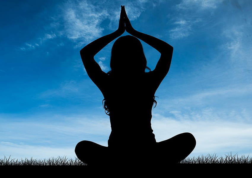 Silhouette of a woman sitting on grass and practicing yoga from PikWizard, Yoga Silhouette HD wallpaper