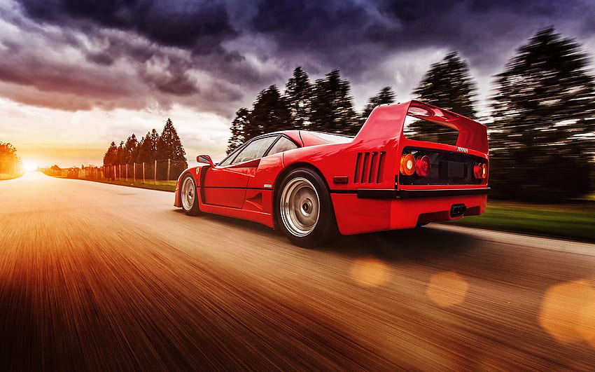 Czerwony supersamochód Ferrari F40 z dużą prędkością Tapeta HD