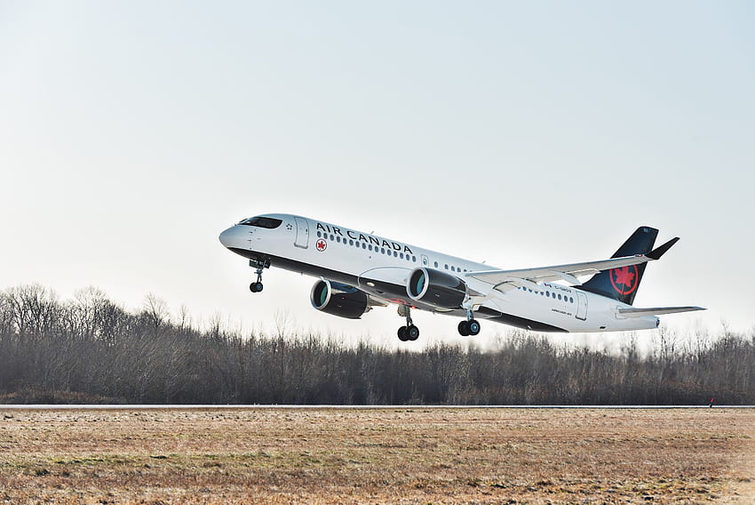 Air Canada esaminerà i test rapidi COVID 19 con Spartan Sfondo HD