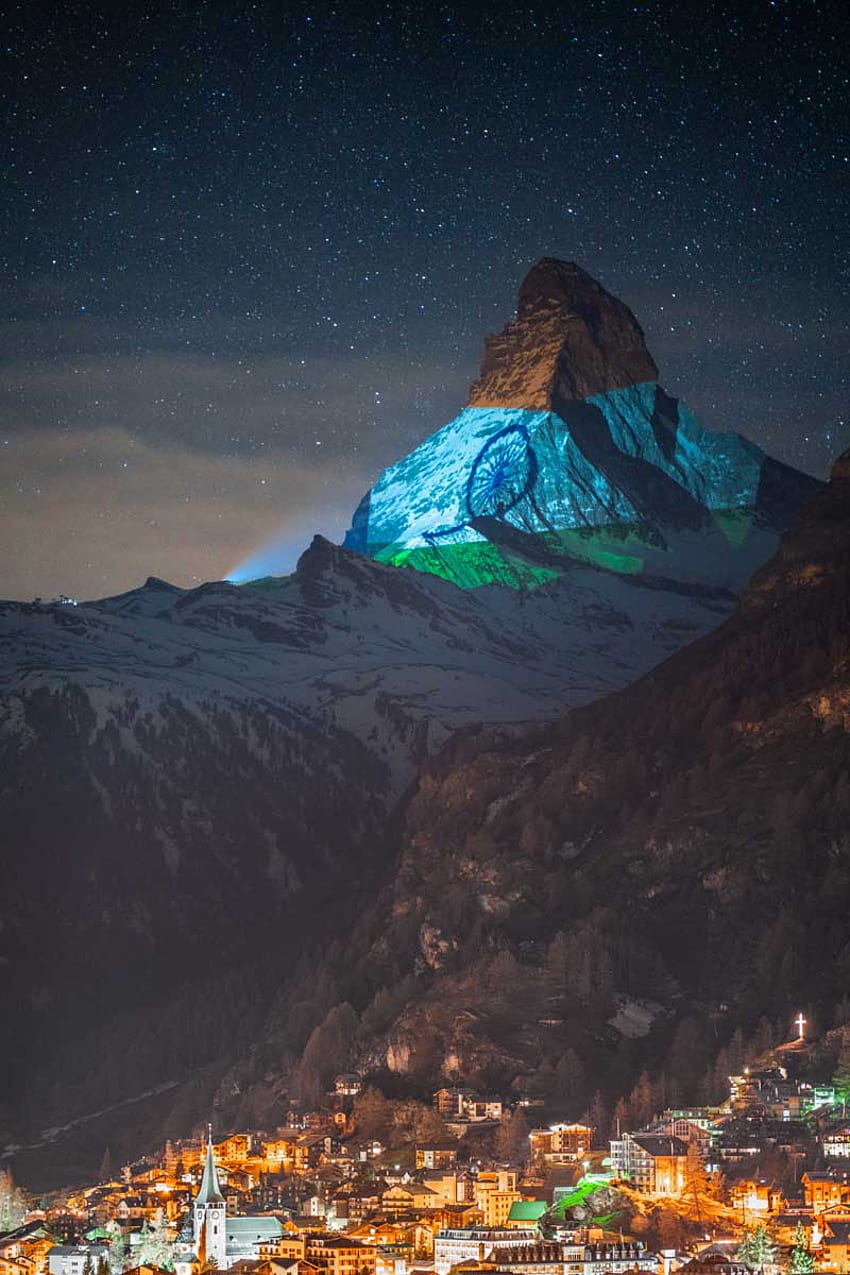 Switzerland's Matterhorn peak lights up with the Indian flag. Condé Nast Traveller India, Switzerland Night HD phone wallpaper