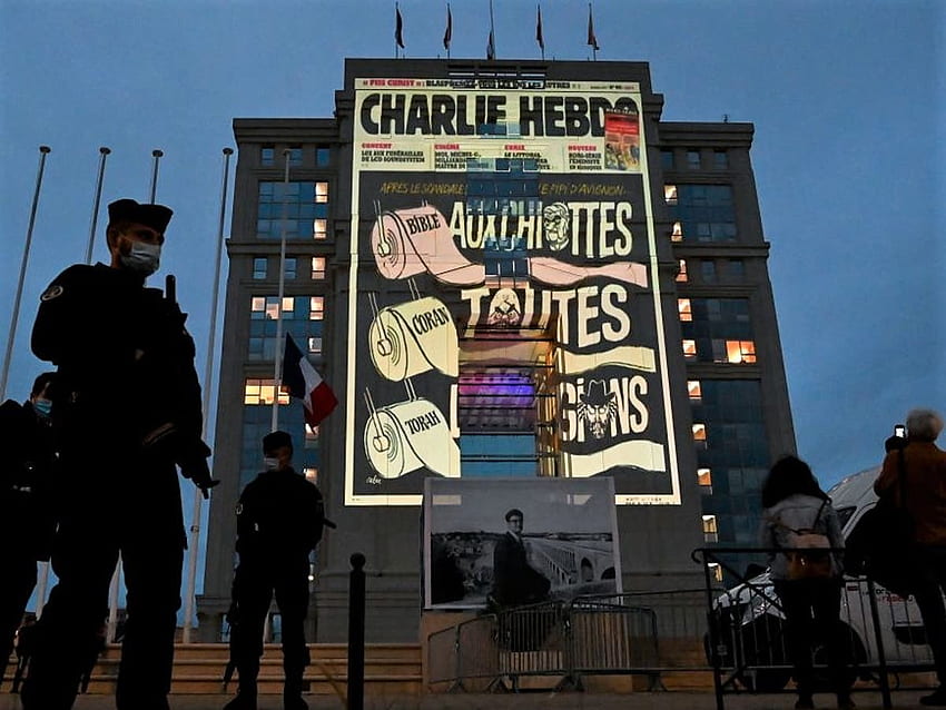 Charlie Hebdo Muhammad cartoons projected onto government buildings in defiance of Islamist terrorists, France Cartoon HD wallpaper
