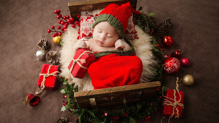 Cute Newborn Baby Is Sleeping On Little Wooden Cot Wearing Red Woolen Knitted Cap Cute HD wallpaper