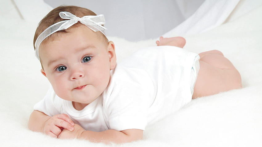 Grey Eyes Cute Baby Is Lying Down On White Cloth Wearing White Dress And Headband Cute HD wallpaper