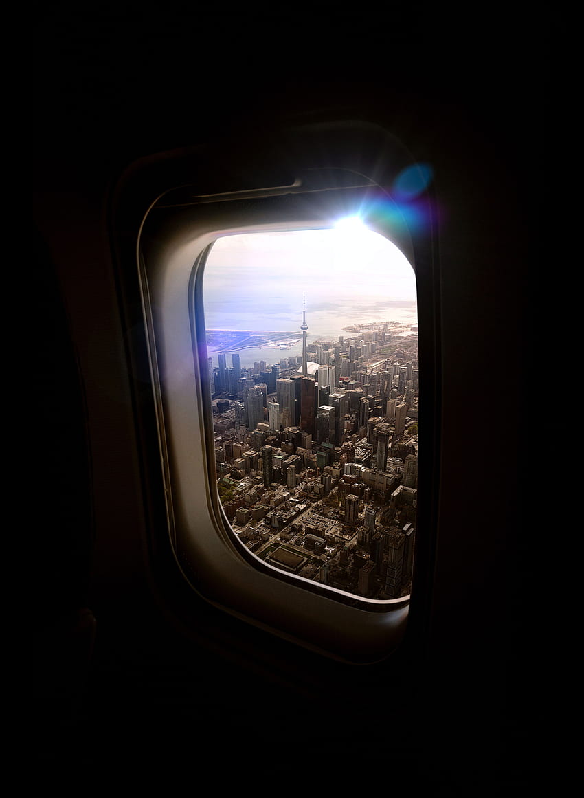 飛行機の窓からの街並みの空撮 · ストック HD電話の壁紙