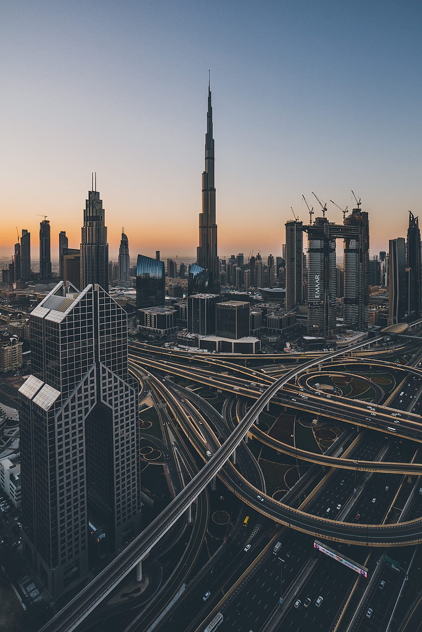 Dubai, paisagem urbana, nascer do sol, estrada, ponte, edifícios Papel de parede de celular HD