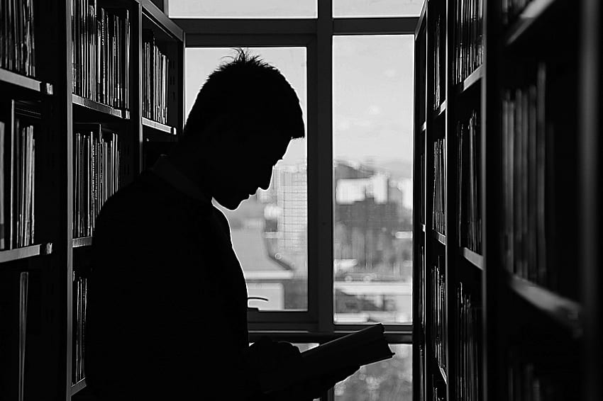 adult, architecture, black and white, book, building, city, dark, indoors, library, light, man, person, portrait, read, reading, room, shadow, side view, silhouette, street, student, study, window . Mocah HD wallpaper