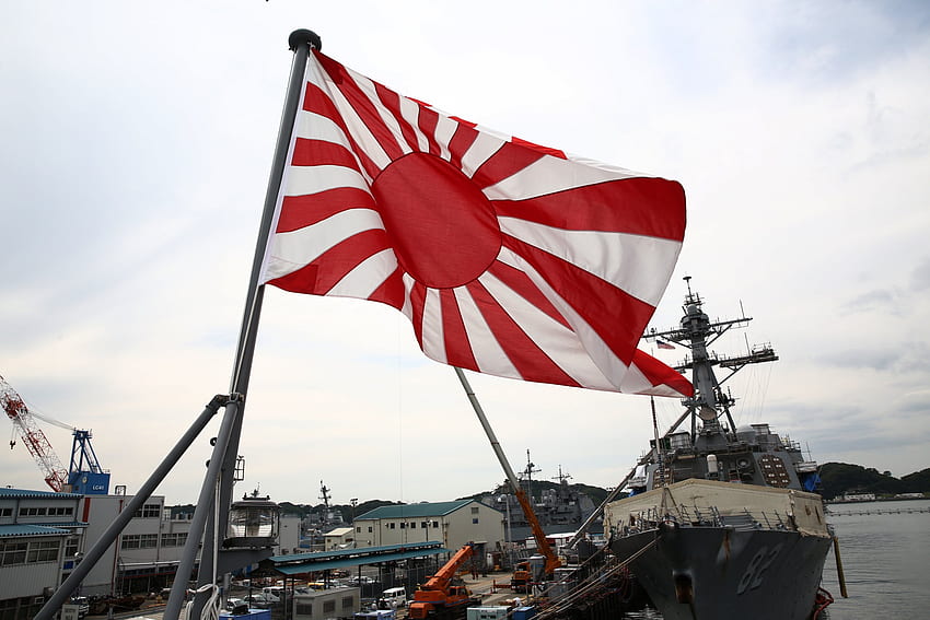 Japan verwendet immer noch die Militärflagge des Imperiums und die Koreas vereinen sich dagegen, die Flagge der aufgehenden Sonne HD-Hintergrundbild