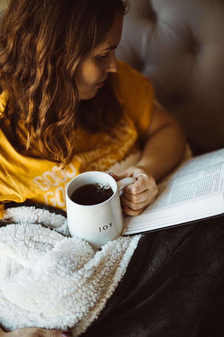 woman reading book while holding mug of coffee – Human on Unsplash HD phone wallpaper