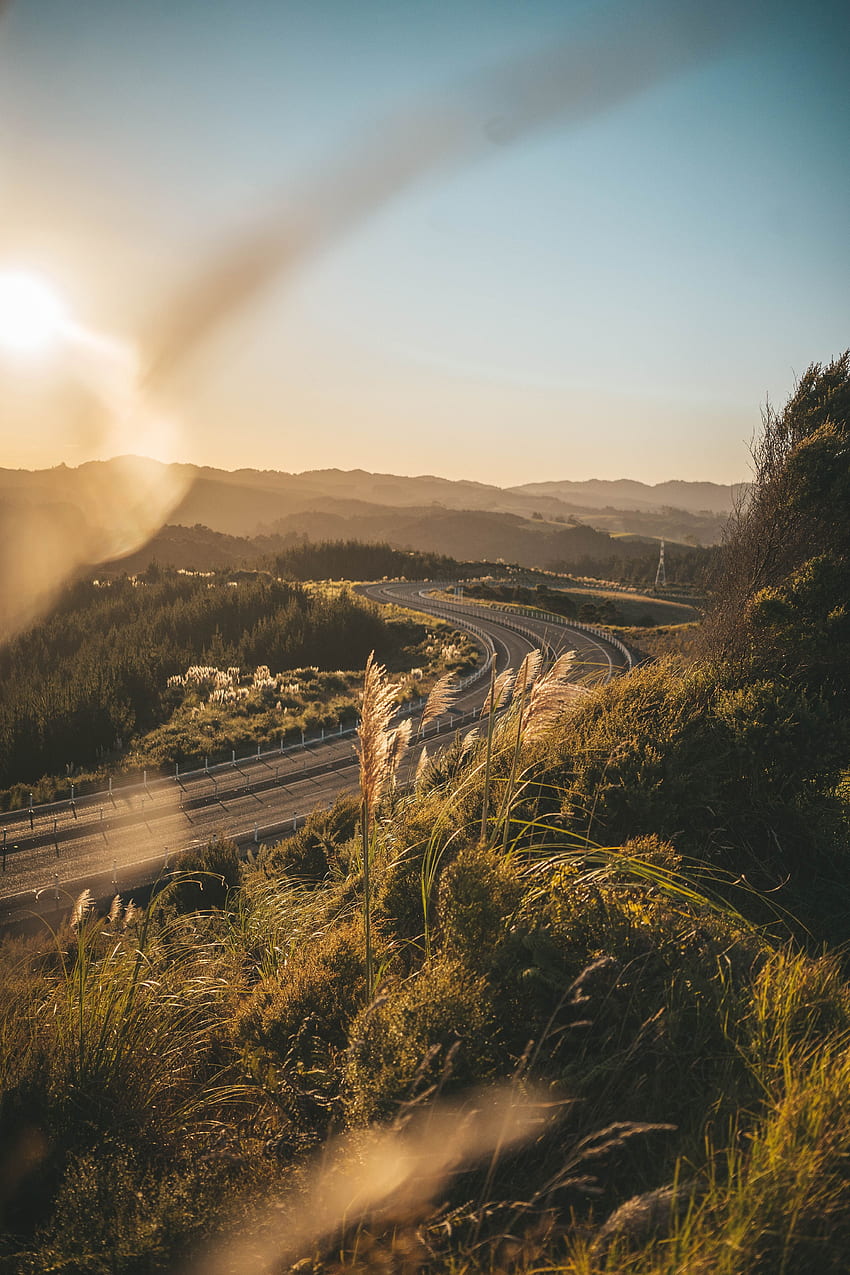 landscape-nature-grass-sky-road-turn-hd-phone-wallpaper-pxfuel