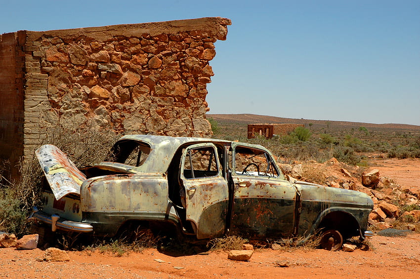 Car Remnants, old, decay, sand, parts, rusty, desert, bricks HD wallpaper