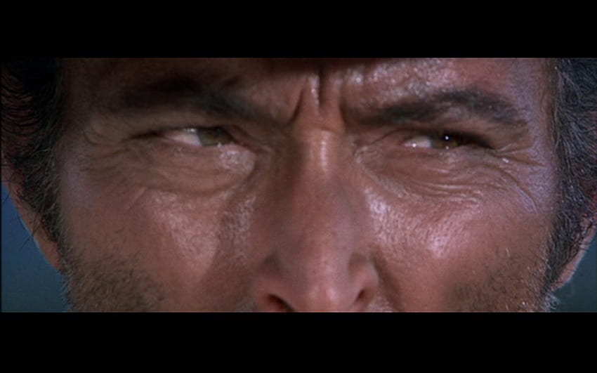 Клинт Иствуд. Клинт Иствуд глаза. Клинт Иствуд взгляд с прищуром.