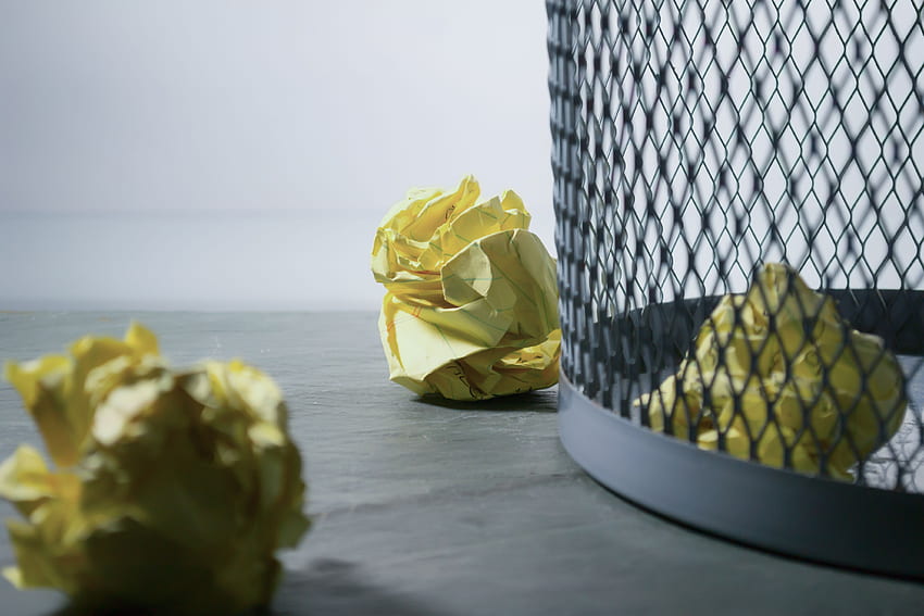 Focus of Yellow Paper Near Trash Can · Stock HD wallpaper