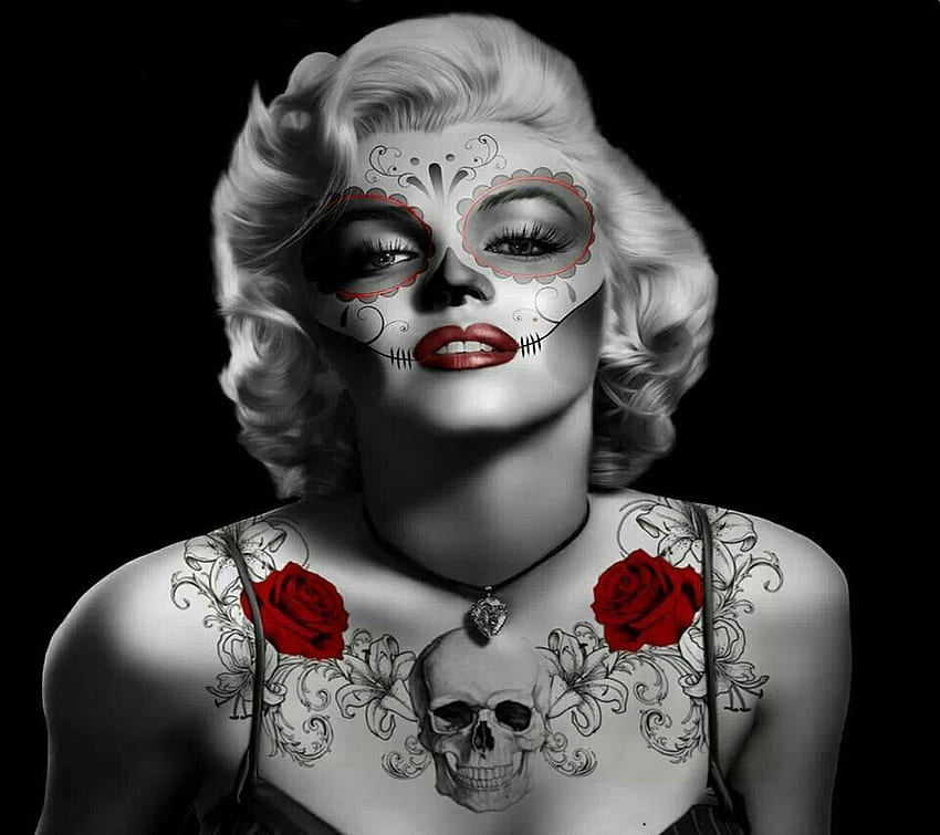 Marilyn Monroe tattoo on the right upper arm and
