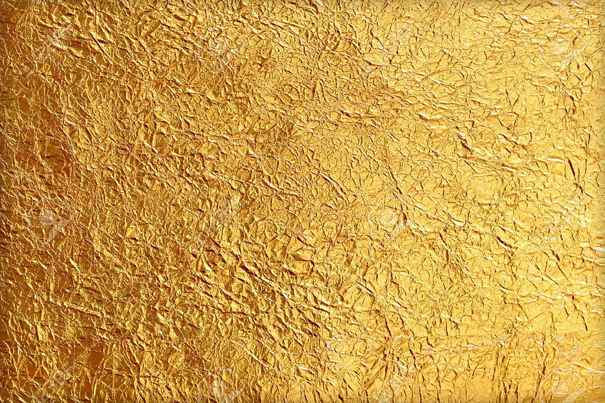 光沢のある黄色の葉の金箔のテクスチャ背景ストック。 金箔の質感、金属の質感、織り目加工の背景 高画質の壁紙