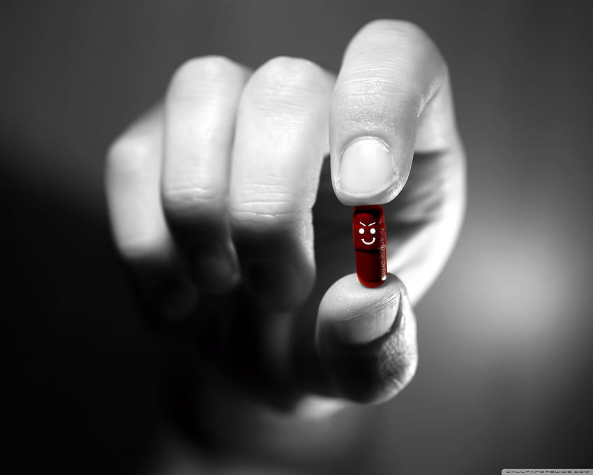 Red Pill Hand HD wallpaper