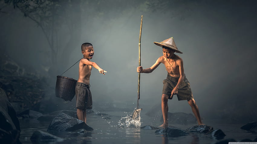 Boy Catching Fish with a Spear HD wallpaper