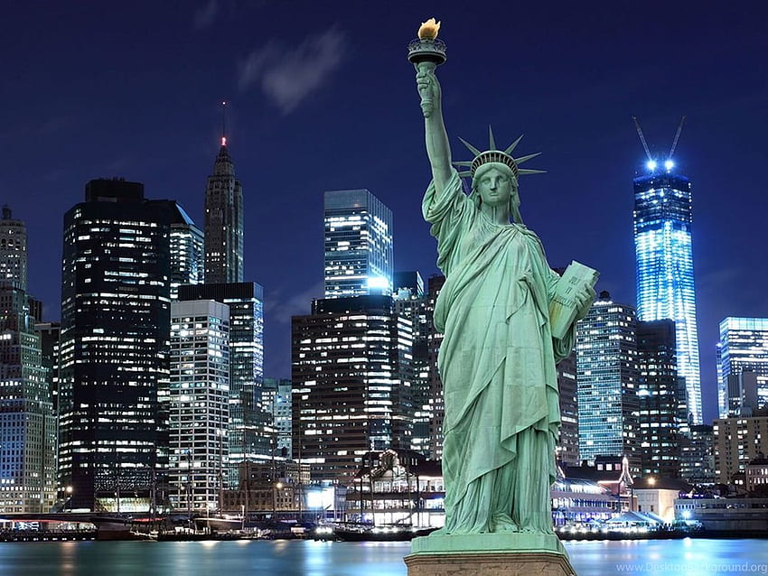Estatua De La Libertad De Nueva York En La Noche. fondo de pantalla